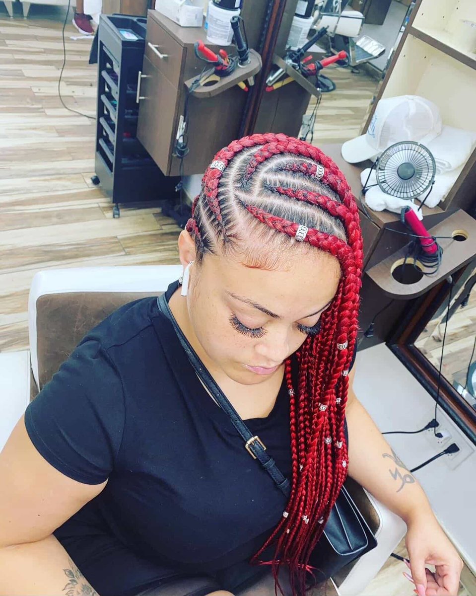Red knotless box braids with beads
