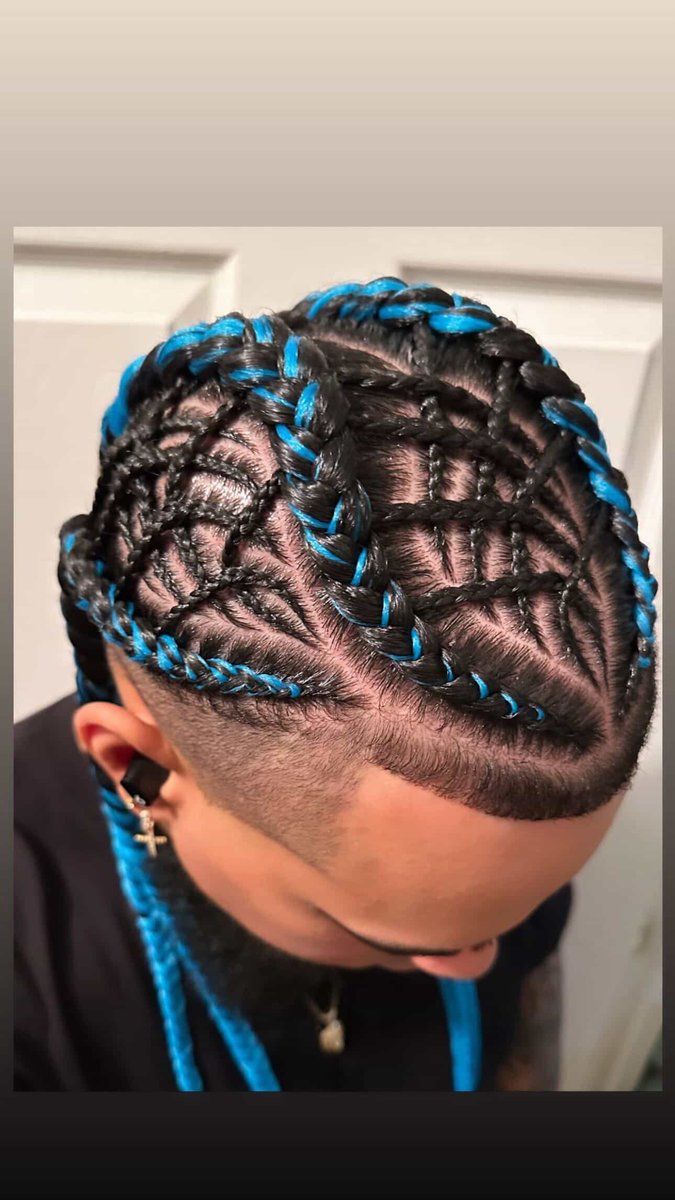 Stitch cornrows with blue extensions